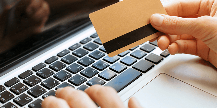 Prepaid Card Code Person inserting code of prepaid card